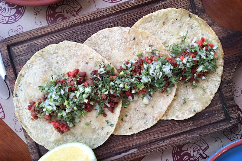 Al Pastor Tacos with pineapple and cilantro